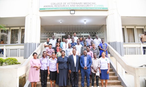 Participants take off time for a group photo at the Gender policy dissemination engagement