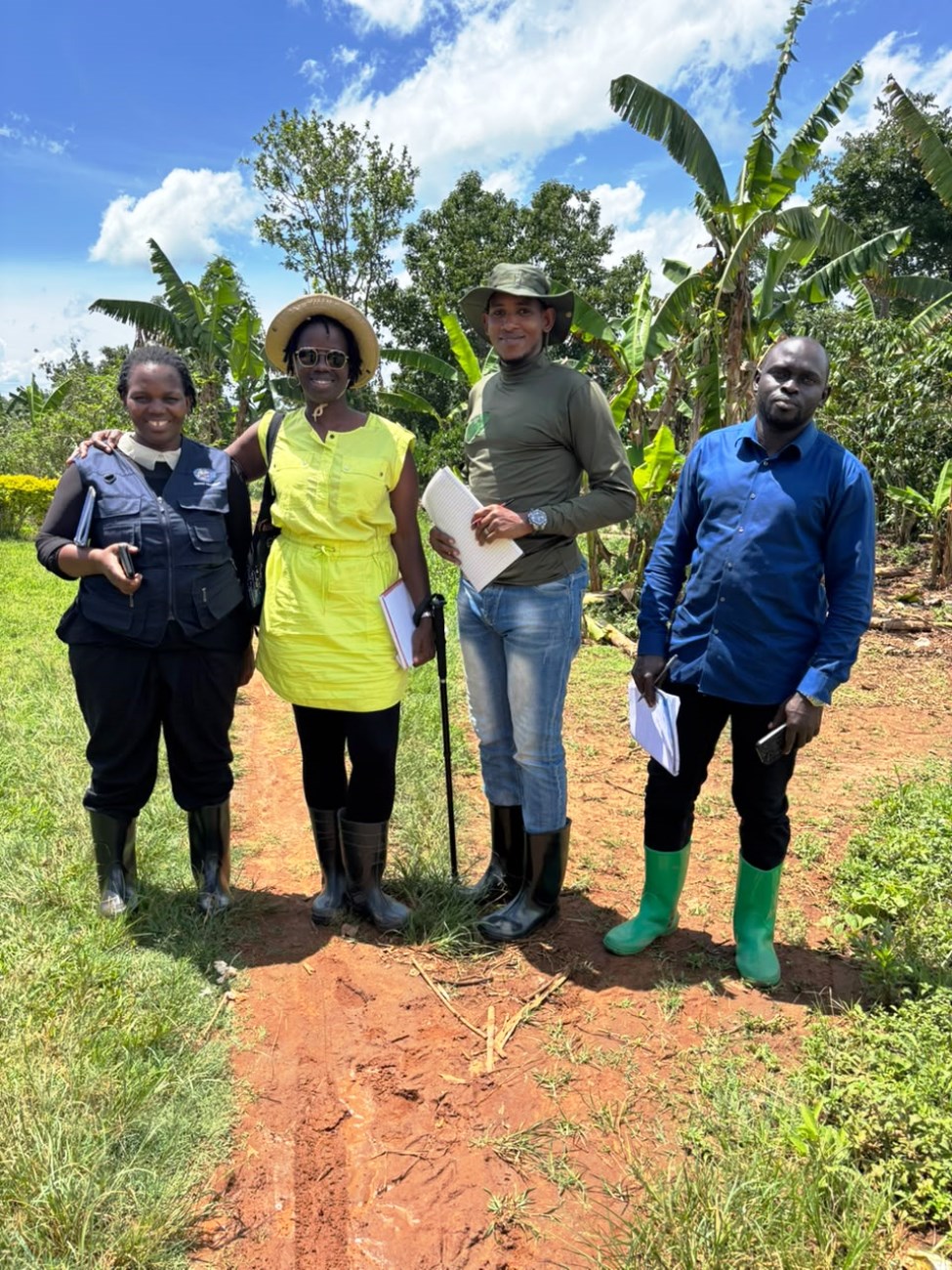 Some of the PARI XIII students pose for a photo during their transect walk from Bananze Village to Mwera Tea Estate in Mityana (L-R Nambalirwa, Agena, Mufuruki and Mayanja). PhD in Agricultural and Rural Innovation XIII, Department of Extension and Innovation Studies, College of Agricultural and Environmental Sciences (CAES), Makerere University Field Course, 4th-16th Oct 2026, Mwera Parish, Mityana District, Uganda, East Africa.