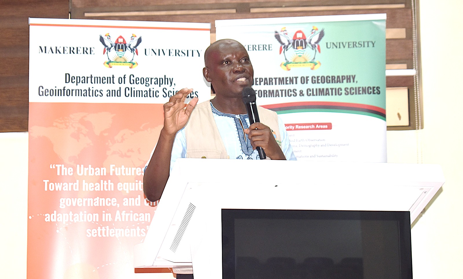 Dr Paul Mukwaya Isolo, Coordinator of the Action Urban Lab and Urban Futures Project briefing participants about the relevance of the exercise. Urban Action Lab community-level systems-mapping workshop to develop a shared understanding of how solid waste, drainage, flooding, climate vulnerability, health, and livelihoods interact within Kampala’s informal settlements 1st October 2026, School of Public Health Auditorium, Makerere University, Kampala Uganda, East Africa.