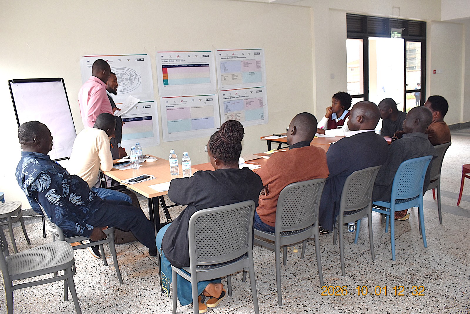 Participants during the community mapping exercise. Urban Action Lab community-level systems-mapping workshop to develop a shared understanding of how solid waste, drainage, flooding, climate vulnerability, health, and livelihoods interact within Kampala’s informal settlements 1st October 2026, School of Public Health Auditorium, Makerere University, Kampala Uganda, East Africa.