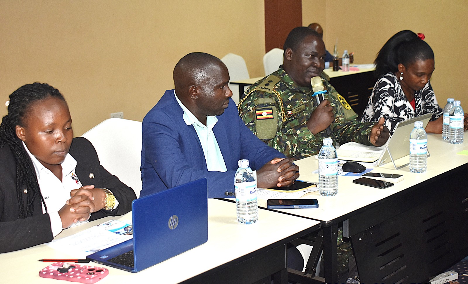 Daniel Okello (2nd R), CBRN Expert at the Ministry of Defence and Veteran Affairs, briefs participants on the role of his unit in Uganda’s minerals sector. Department of Geology and Petroleum Studies, College of Natural Sciences, Makerere University stakeholder workshop to get input on the review of its Geology curricula and the development of industry-aligned short courses supported by the Government of the Federal Republic of Germany and the European Union through Deutsche Gesellschaft für Internationale Zusammenarbeit (GIZ), 6th October 2026 at Silver Springs Hotel, Bugolobi, Kampala, Uganda, East Africa.