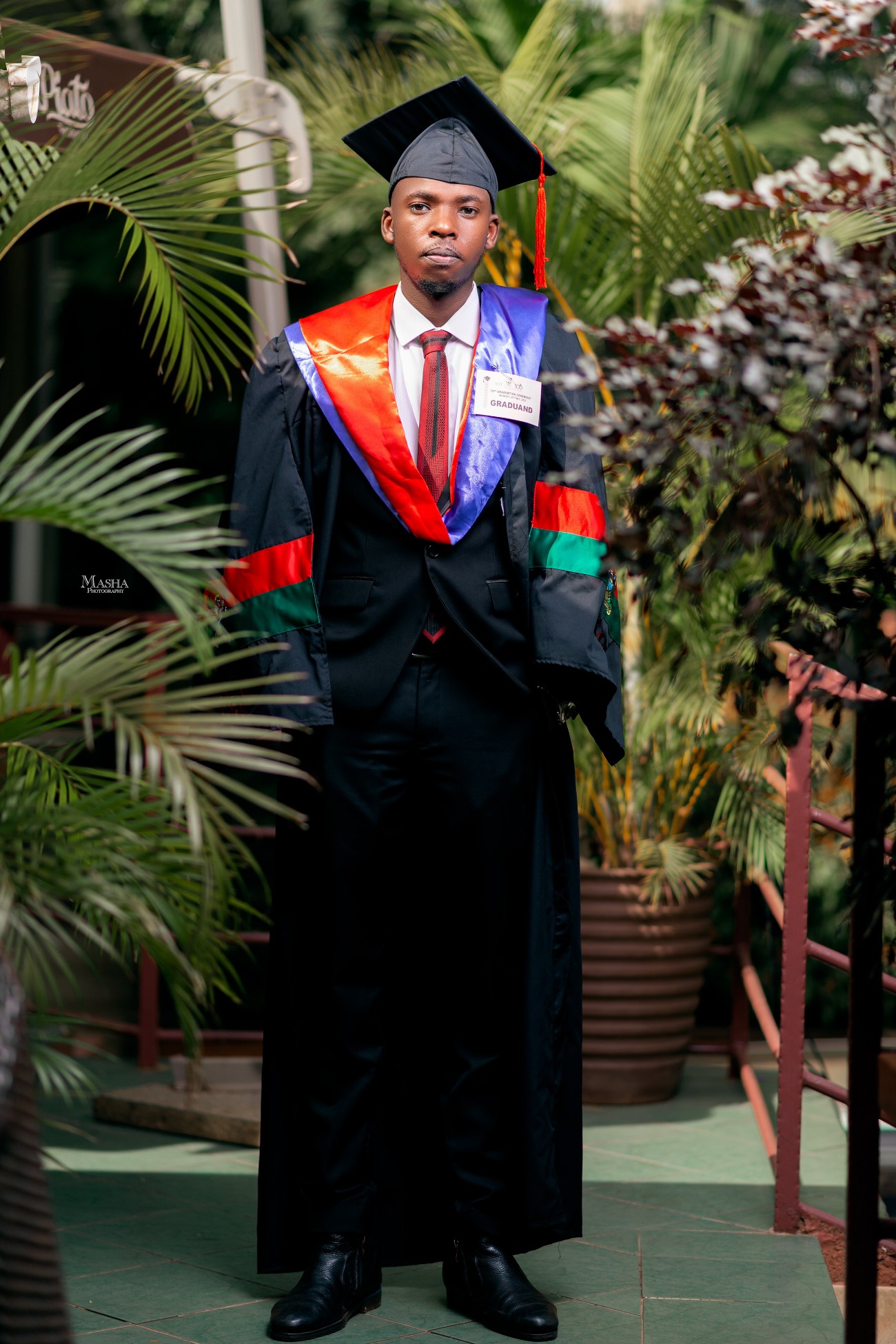 Khabusi Timothy on his graduation day in 2022. Impact Stories: Timothy Khabusi, Mastercard Foundation Scholars Program alumnus, optometrist, researcher, programmer, and eye health entrepreneur, on an ambitious mission to improve eye health in Uganda, October 2026, Makerere University, Kampala Uganda, East Africa.