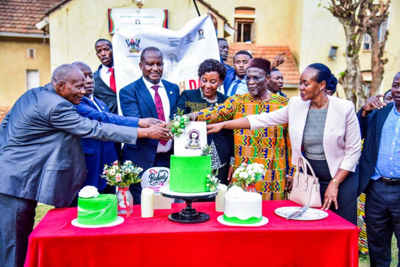 Dignitaries cut cake in the Nkrumah Hall parking lot as part of the celebrations. Nkrumah Day and Public Lecture organised by Nkrumah Hall under the theme “Leadership, Self-Reliance and Transformation: Reimagining Nkrumah's Vision for the 21st Century African Youth,” 8th October 2026, Yusuf Lule Central Teaching Facility Auditorium, Makerere University, Kampala Uganda, East Africa.