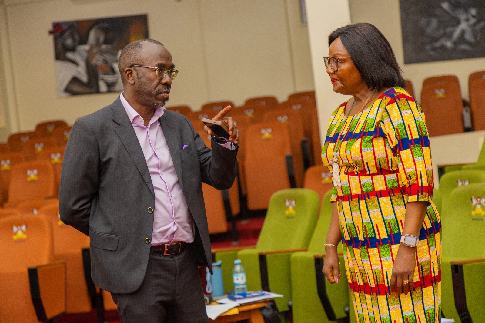MakSPH Dean Prof. Rhoda Wanyenze (right) speaks with Dr. Andrew Ocero of FHI 360 during the EPiC validation workshop on Uganda’s Ebola and Marburg outbreak responses, 6 October 2026. Makerere University School of Public Health and FHI 360 country validation workshop convened by the Meeting Targets and Maintaining Epidemic Control (EPiC) project, to examine lessons from Uganda’s response to filovirus disease outbreaks, 6th October 2026, MakSPH Auditorium, Makerere University, Kampala Uganda, East Africa.
