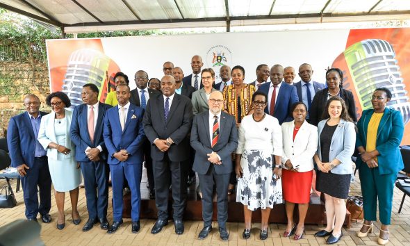 Stakeholders pose for a group photo at the UPHIA preliminary results release on 1st October 2026. Released of preliminary findings of the 2025 Uganda Population-Based HIV Impact Assessment (UPHIA 2025), a national household survey that provides a current picture of the country’s HIV response and selected non-communicable disease indicators, Ministry of Health-overall leadership, Makerere University School of Public Health (MakSPH)-prime implementing organisation, working with UVRI, UBOS, regional referral hospitals and local governments. Funded by PEPFAR through the U.S. CDC, 1st October 2026, Uganda Media Centre, Kampala Uganda, East Africa.