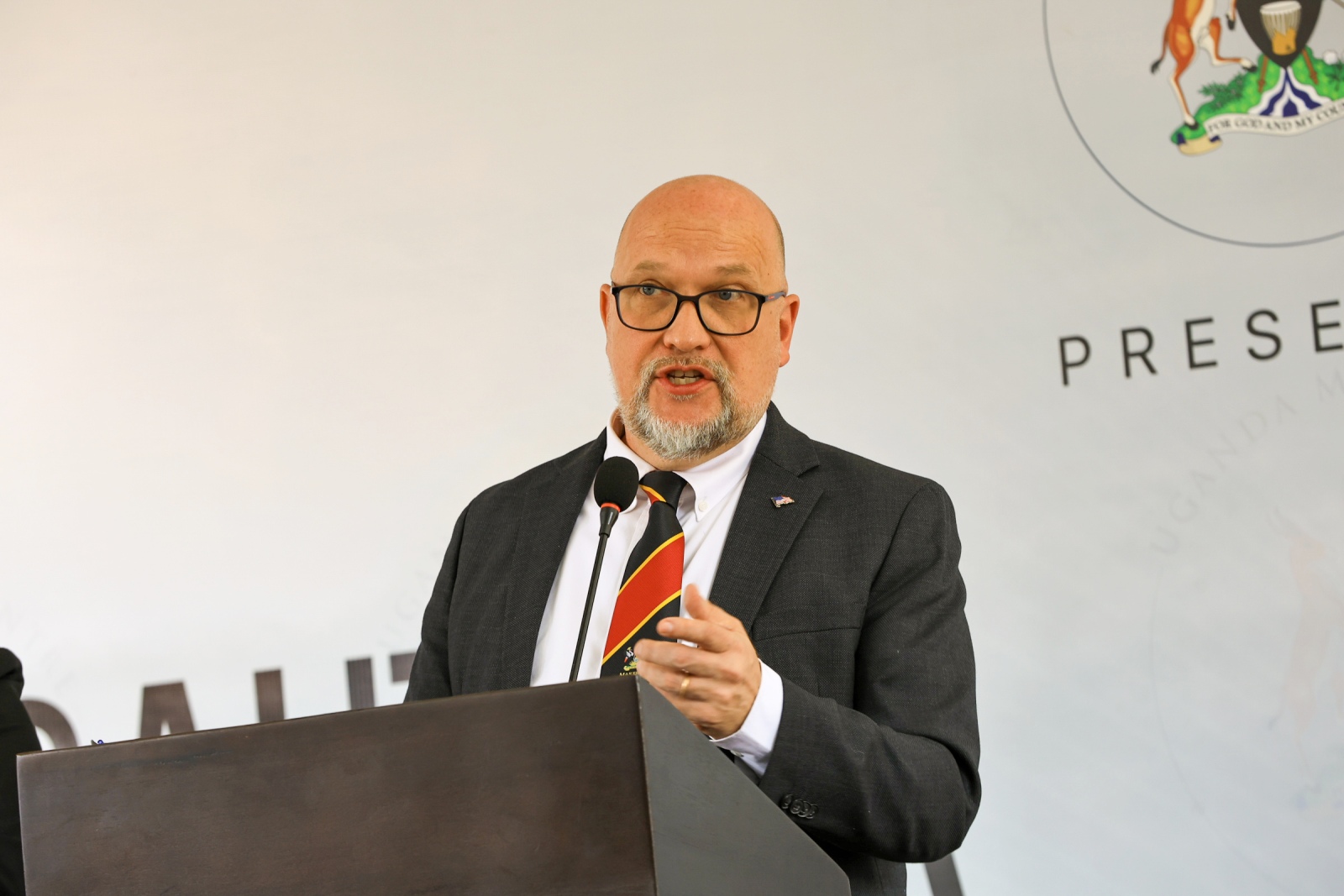 U.S. Embassy Chargé d’Affaires Mikael (Mika) Cleverley highlights Ugandan leadership and U.S. support for UPHIA 2025 at the preliminary results release, Uganda Media Centre, 1 October 2026. Release of preliminary findings of the 2025 Uganda Population-Based HIV Impact Assessment (UPHIA 2025), a national household survey that provides a current picture of the country’s HIV response and selected non-communicable disease indicators, Ministry of Health-overall leadership, Makerere University School of Public Health (MakSPH)-prime implementing organisation, working with UVRI, UBOS, regional referral hospitals and local governments. Funded by PEPFAR through the U.S. CDC, 1st October 2026, Uganda Media Centre, Kampala Uganda, East Africa.
