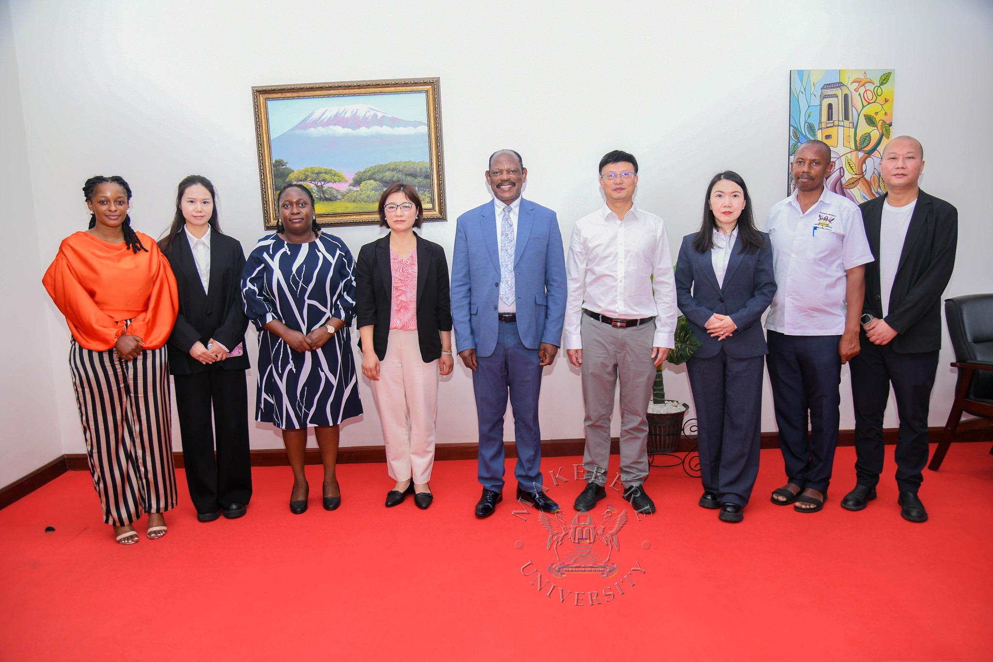 Prof. Barnabas Nawangwe (C) with Prof. Dingyu Ou (4th R) and R-L: Mr. Fei Tang, Prof. Gilbert Gumoshabe, Prof. Fang Hao, Prof. Zhuoqiong Xia, Ms. Hawa Ndagire Kajumba, Ms. Miao Yang and Ms. Betty Nabisubi after the meeting on 12th October 2026. Visit by a delegation from Xiangtan University headed by Professor Dingyu Ou, in company of Mr. Tang Fei and Professor Gilbert Gumshabe, the Chinese and Ugandan Directors of the Confucius Institute at Makerere University respectively, to update 20-year academic partnership, with new focus on joint Master's degree program in Chemical Engineering 12th October 2026, French Embassy, Kampala Uganda, East Africa.