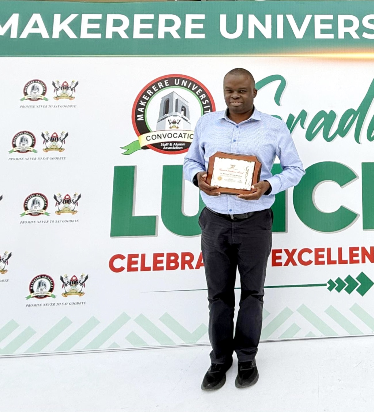 Dr. Stephen Wandera poses with his VC Research Excellence Award during the 76th Graduation Ceremony. Photo: CARTA, Makerere University, Kampala Uganda, East Africa