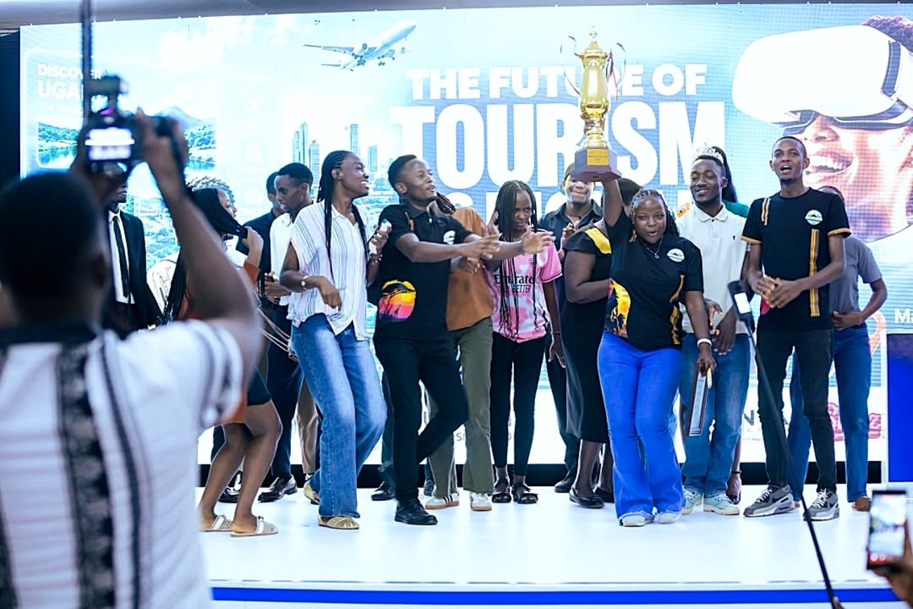The tourism students jubilate upon receiving the trophy. Courtesy Photo. Makerere University Students Win Inter-University tourism quiz that tested students’ knowledge of tourism, Ugandan culture and heritage, as well as their ability to interpret photographic representations of tourism attractions at the Ministry of Tourism, Wildlife and Antiquities, Makerere University Business School (MUBS) and the Uganda Tourism Board workshop on theme “ Digital agenda, artificial intelligence to redesign tourism", 18th September 2026, Makerere University Business School (MUBS), Kampala Uganda, East Africa.